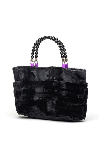 Black bag in mink and lamb...