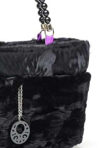 Black bag in mink and lamb...