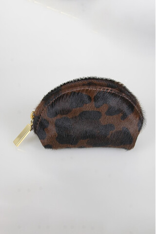 Purses in spotted print pony
